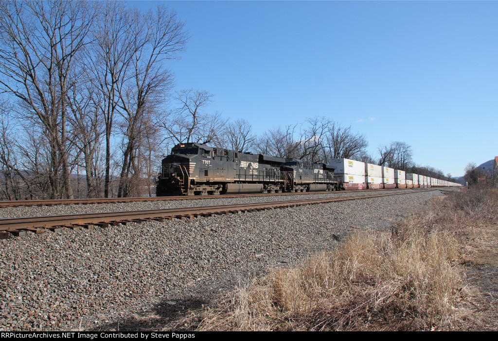 NS 7707 and 7621 with a westbound container train